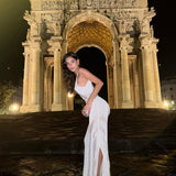 Ella Mendelsohn - Odessa Silver V Neck Knit Maxi Dress | Moeva | | Each week unveils new pieces—luxury swimwear, fluid resort silhouettes, and elevated summer-to-evening essentials designed to carry you from coastal escapes to city nights.