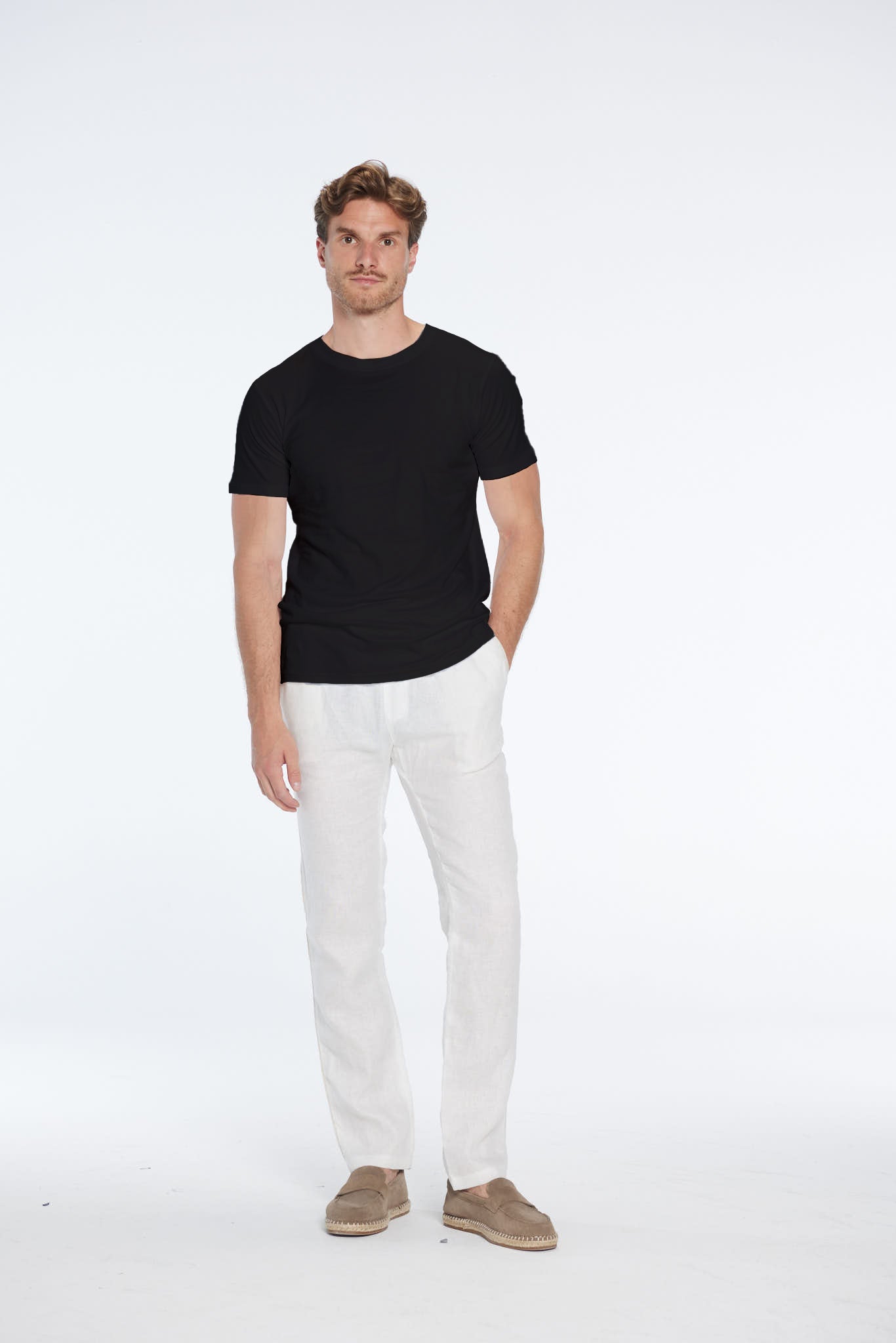 Atlas Black Cotton Round Neck T-Shirt | Moeva | Men Round Neck Shirts | Each week unveils new pieces—luxury swimwear, fluid resort silhouettes, and elevated summer-to-evening essentials designed to carry you from coastal escapes to city nights.