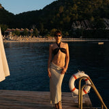 Natalie Lim Suarez - Meredith Black Halter High Waist Satin Bikini Set | Moeva | Bikini Sets | Each week unveils new pieces—luxury swimwear, fluid resort silhouettes, and elevated summer-to-evening essentials designed to carry you from coastal escapes to city nights.