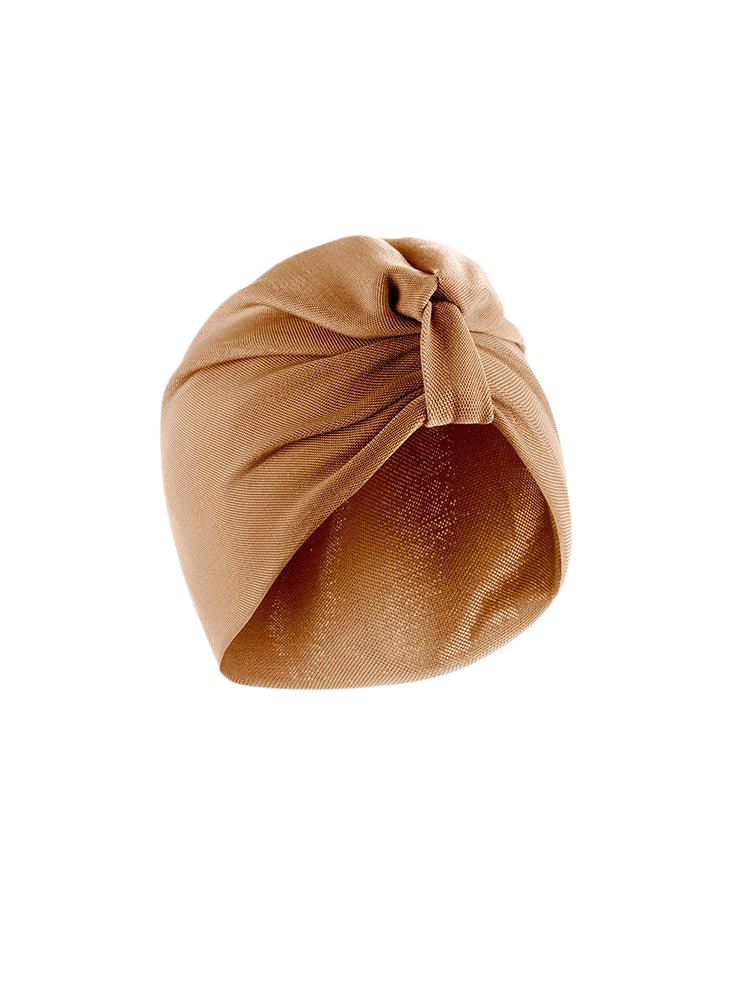 Noor Bronze Turban | Moeva | Turban | Each week unveils new pieces—luxury swimwear, fluid resort silhouettes, and elevated summer-to-evening essentials designed to carry you from coastal escapes to city nights.