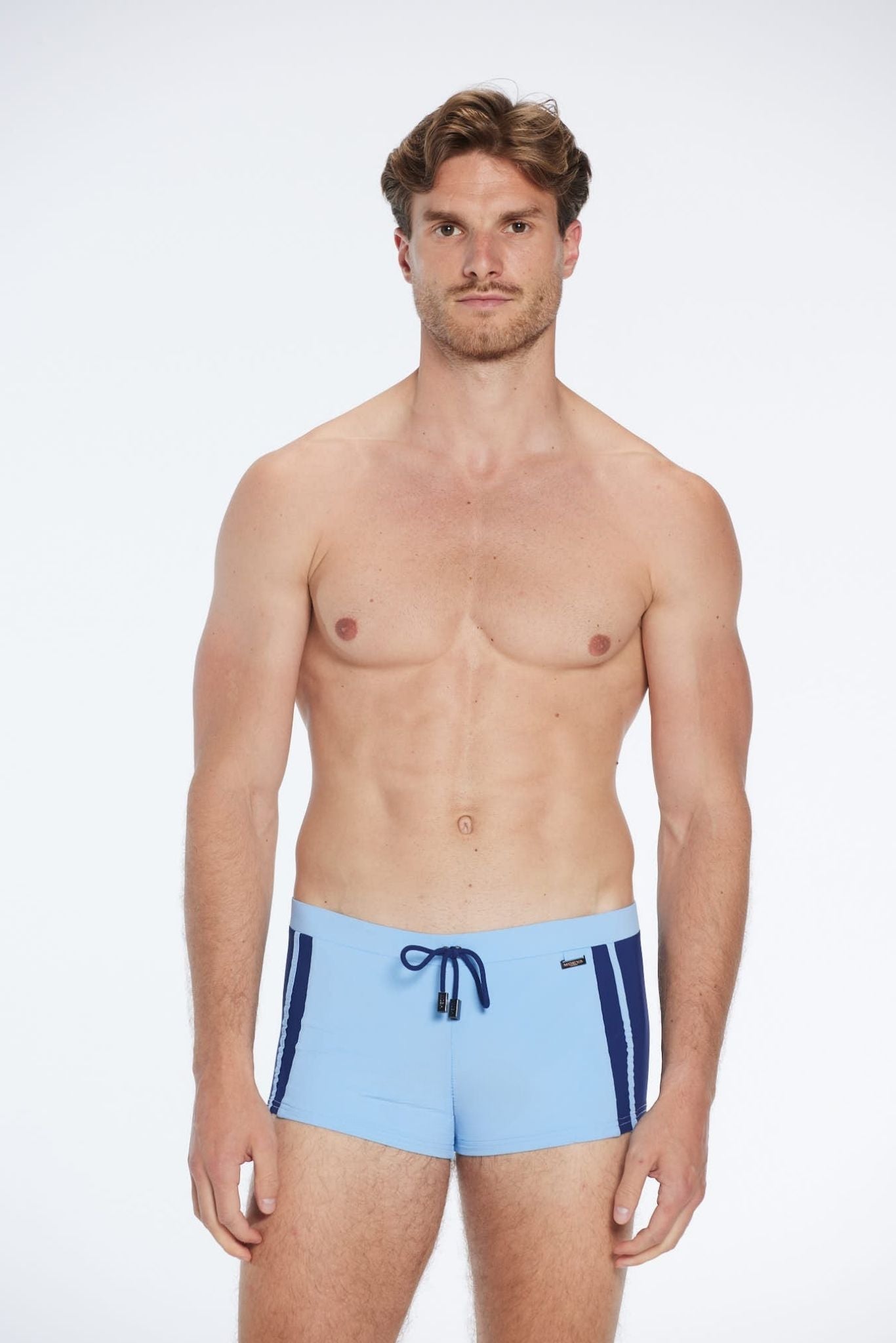 Antonio Baby Blue / Blue Swim Trunks with Drawcord | Moeva | Trunks | Each week unveils new pieces—luxury swimwear, fluid resort silhouettes, and elevated summer-to-evening essentials designed to carry you from coastal escapes to city nights.