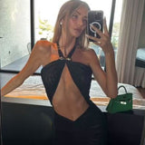 Lisa Kistermann- Carolina Black Cut-Out Halter Swimdress | Moeva | One-Piece | Each week unveils new pieces—luxury swimwear, fluid resort silhouettes, and elevated summer-to-evening essentials designed to carry you from coastal escapes to city nights.