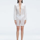 Carina Zavline - Zarya White Triangle Textured Mid Coverage Bikini Set - Althea White ;Long Sleeve Lace Mini Kaftan | Moeva | | Each week unveils new pieces—luxury swimwear, fluid resort silhouettes, and elevated summer-to-evening essentials designed to carry you from coastal escapes to city nights.