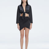 Greta Black Satin Long Sleeve Tie Front Shirt | Moeva | Top | Each week unveils new pieces—luxury swimwear, fluid resort silhouettes, and elevated summer-to-evening essentials designed to carry you from coastal escapes to city nights.