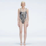 Calista Black Plunge Scoop Neck Swimsuit | Moeva | Swimsuit | Each week unveils new pieces—luxury swimwear, fluid resort silhouettes, and elevated summer-to-evening essentials designed to carry you from coastal escapes to city nights.