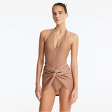 Clementine Bronze Halterneck Swimsuit with Tie-Front Skirt Detail | Moeva | Swimsuit | Each week unveils new pieces—luxury swimwear, fluid resort silhouettes, and elevated summer-to-evening essentials designed to carry you from coastal escapes to city nights.