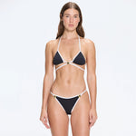 Cobie Black-White Triangle Mid Coverage Textured Bikini Set | Moeva | Bikini Set | Each week unveils new pieces—luxury swimwear, fluid resort silhouettes, and elevated summer-to-evening essentials designed to carry you from coastal escapes to city nights.