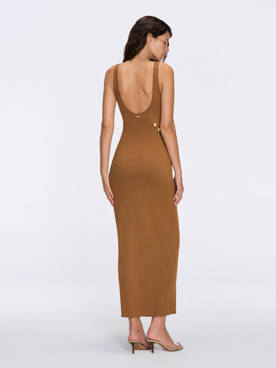 Raine Brown Knit Maxi Dress with Side Slit & Button Detail by Moeva | Dress from MOEVA's luxury swimwear and resortwear collection, perfect for beach days, resort escapes and summer styling.