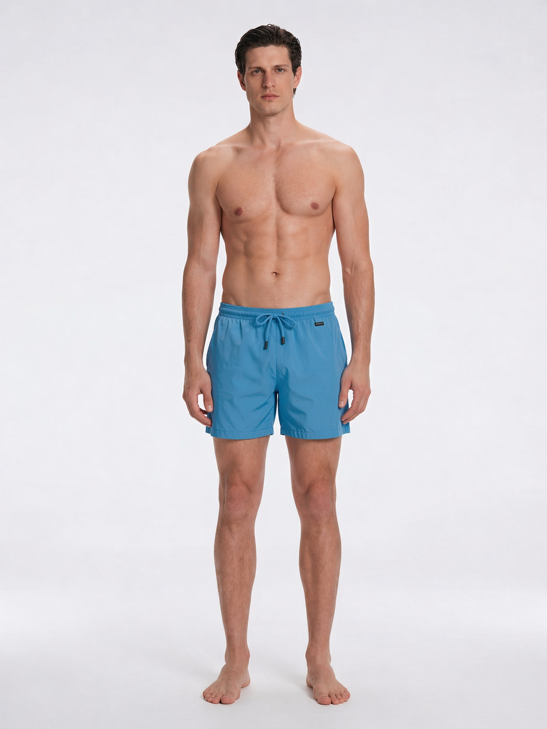 Louis Teal Quick-Dry Swim Shorts | Moeva | Shorts | Each week unveils new pieces—luxury swimwear, fluid resort silhouettes, and elevated summer-to-evening essentials designed to carry you from coastal escapes to city nights.