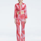 Greta Red Long Sleeve Tie Front Shirt | Moeva | Top | Each week unveils new pieces—luxury swimwear, fluid resort silhouettes, and elevated summer-to-evening essentials designed to carry you from coastal escapes to city nights.