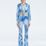 Greta Blue Long Sleeve Tie Front Shirt | Moeva | Top | Each week unveils new pieces—luxury swimwear, fluid resort silhouettes, and elevated summer-to-evening essentials designed to carry you from coastal escapes to city nights.