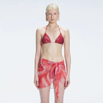 Evita Red Optical Tie Side Sarong | Moeva | Sarong | Each week unveils new pieces—luxury swimwear, fluid resort silhouettes, and elevated summer-to-evening essentials designed to carry you from coastal escapes to city nights.