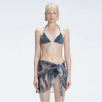 Evita Black Optical Tie Side Sarong | Moeva | Sarong | Each week unveils new pieces—luxury swimwear, fluid resort silhouettes, and elevated summer-to-evening essentials designed to carry you from coastal escapes to city nights.