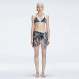 Evita Black Optical Tie Side Sarong | Moeva | Sarong | Each week unveils new pieces—luxury swimwear, fluid resort silhouettes, and elevated summer-to-evening essentials designed to carry you from coastal escapes to city nights.