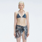 Evita Black Optical Tie Side Sarong | Moeva | Sarong | Each week unveils new pieces—luxury swimwear, fluid resort silhouettes, and elevated summer-to-evening essentials designed to carry you from coastal escapes to city nights.