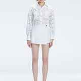 Nola White Long Sleeve Cotton Shirt and Elise White Linen Mini Skort Set | Moeva | Set | Each week unveils new pieces—luxury swimwear, fluid resort silhouettes, and elevated summer-to-evening essentials designed to carry you from coastal escapes to city nights.