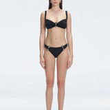 Emilia Black Mid Coverage Solid Bikini Bottom | Moeva | Bikini Bottom | Each week unveils new pieces—luxury swimwear, fluid resort silhouettes, and elevated summer-to-evening essentials designed to carry you from coastal escapes to city nights.