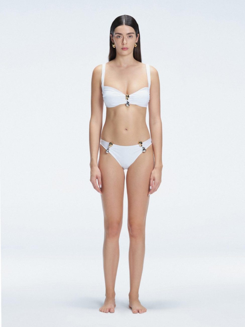 Emilia White Mid Coverage Solid Bikini Bottom | Moeva | Bikini Bottom | Each week unveils new pieces—luxury swimwear, fluid resort silhouettes, and elevated summer-to-evening essentials designed to carry you from coastal escapes to city nights.