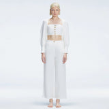 Gemma White Linen Square Neck - Long Sleeve Crop Top | Moeva | Crop Top | Each week unveils new pieces—luxury swimwear, fluid resort silhouettes, and elevated summer-to-evening essentials designed to carry you from coastal escapes to city nights.