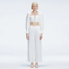 Valencia White Linen High Waist Pant | Moeva | Pants | Each week unveils new pieces—luxury swimwear, fluid resort silhouettes, and elevated summer-to-evening essentials designed to carry you from coastal escapes to city nights.