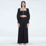 Gemma Square Neck Long Sleeve Top and Valencia High Waist Pants Black Set | Moeva | Set | Each week unveils new pieces—luxury swimwear, fluid resort silhouettes, and elevated summer-to-evening essentials designed to carry you from coastal escapes to city nights.