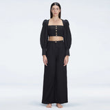 Gemma Square Neck Long Sleeve Top and Valencia High Waist Pants Black Set | Moeva | Set | Each week unveils new pieces—luxury swimwear, fluid resort silhouettes, and elevated summer-to-evening essentials designed to carry you from coastal escapes to city nights.