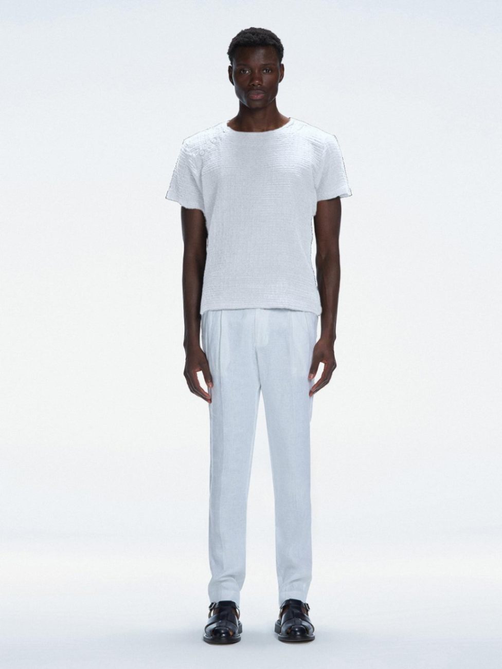 George White Cotton T-Shirt with Button Detail | Moeva | Men Round Neck Shirts | Each week unveils new pieces—luxury swimwear, fluid resort silhouettes, and elevated summer-to-evening essentials designed to carry you from coastal escapes to city nights.