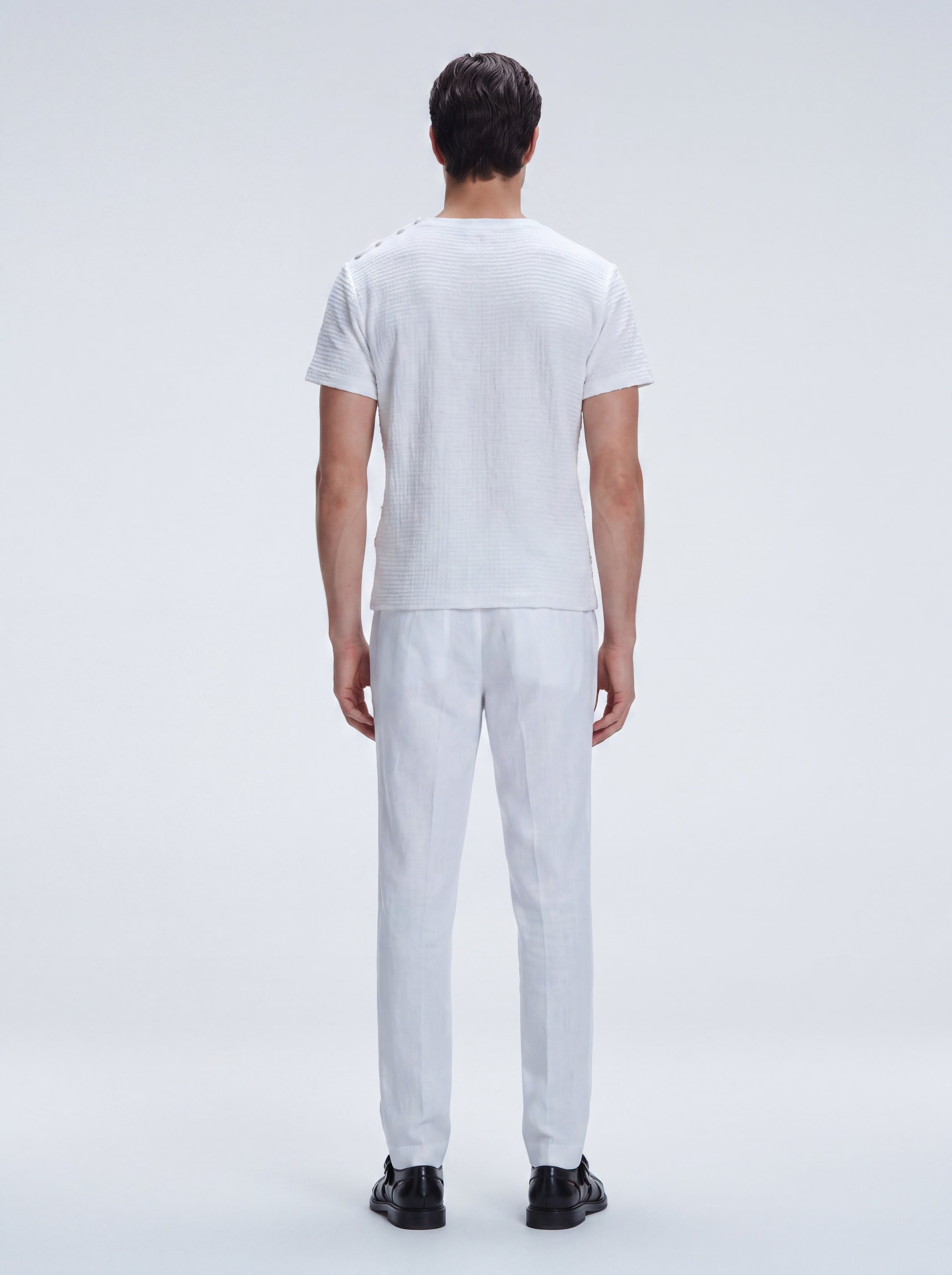 George White Cotton T-Shirt with Button Detail | Moeva | T-Shirt | Each week unveils new pieces—luxury swimwear, fluid resort silhouettes, and elevated summer-to-evening essentials designed to carry you from coastal escapes to city nights.
