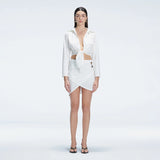 Greta White Long Sleeve Tie Front Shirt and Antonia White High-Waist Wrap Mini Skirt | Moeva | | Each week unveils new pieces—luxury swimwear, fluid resort silhouettes, and elevated summer-to-evening essentials designed to carry you from coastal escapes to city nights.