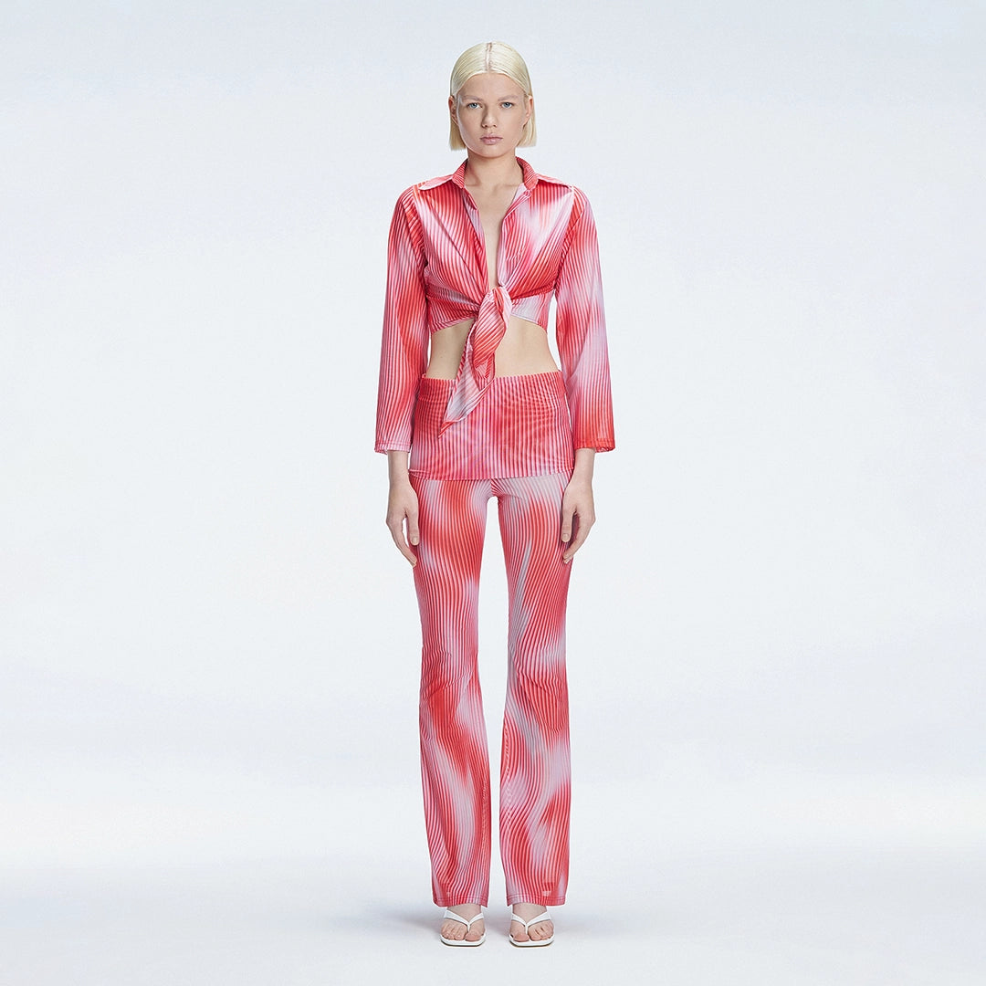 Greta Long Sleeve Tie Front Shirt and Freya High Waist Pants Red Optical Set | Moeva | | Each week unveils new pieces—luxury swimwear, fluid resort silhouettes, and elevated summer-to-evening essentials designed to carry you from coastal escapes to city nights.