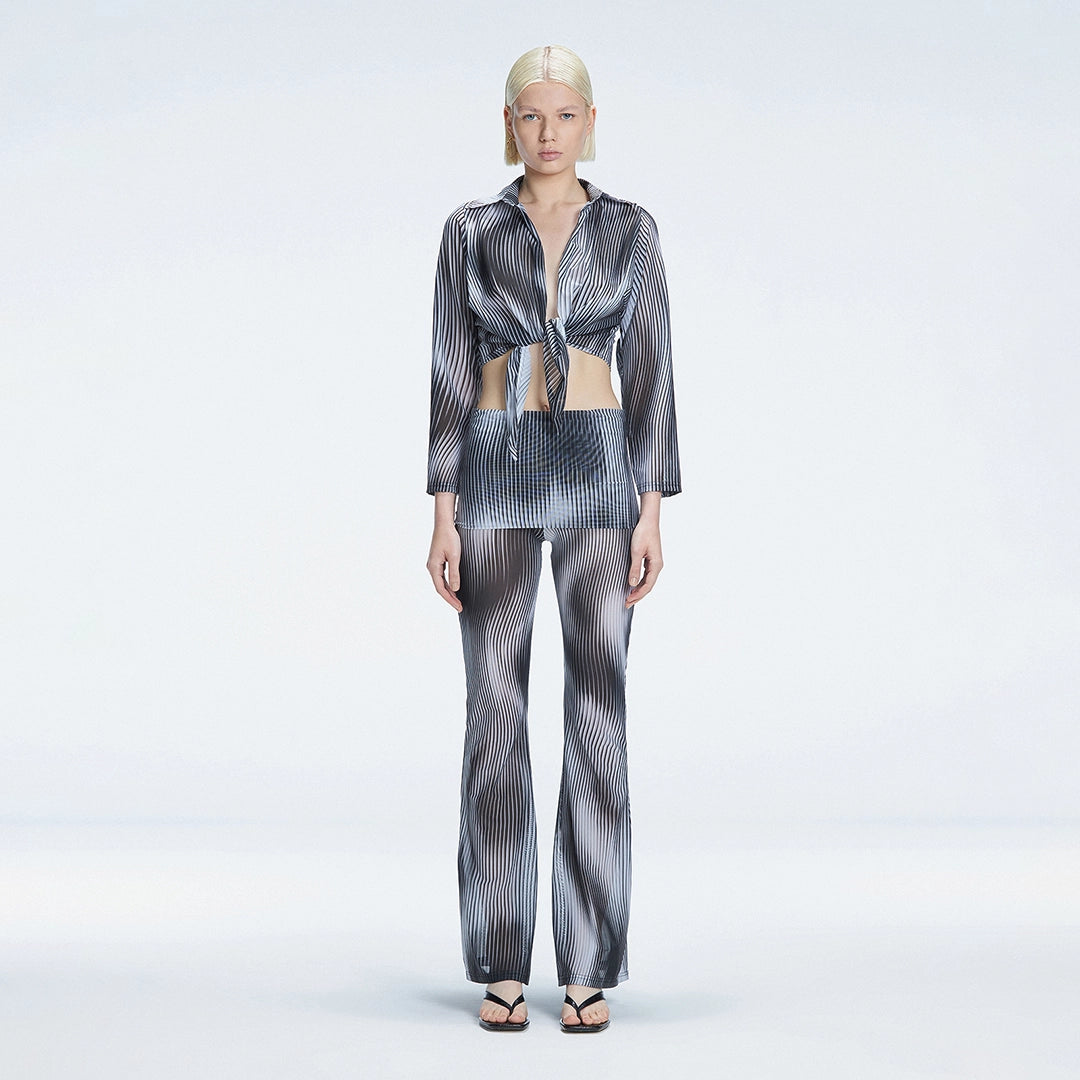 Greta Long Sleeve Tie Front Shirt and Freya High Waist Pants Black Optical Set | Moeva | | Each week unveils new pieces—luxury swimwear, fluid resort silhouettes, and elevated summer-to-evening essentials designed to carry you from coastal escapes to city nights.