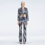 Greta Long Sleeve Tie Front Shirt and Freya High Waist Pants Black Optical Set | Moeva | Set | Each week unveils new pieces—luxury swimwear, fluid resort silhouettes, and elevated summer-to-evening essentials designed to carry you from coastal escapes to city nights.