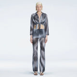 Greta Long Sleeve Tie Front Shirt and Freya High Waist Pants Black Optical Set | Moeva | Set | Each week unveils new pieces—luxury swimwear, fluid resort silhouettes, and elevated summer-to-evening essentials designed to carry you from coastal escapes to city nights.