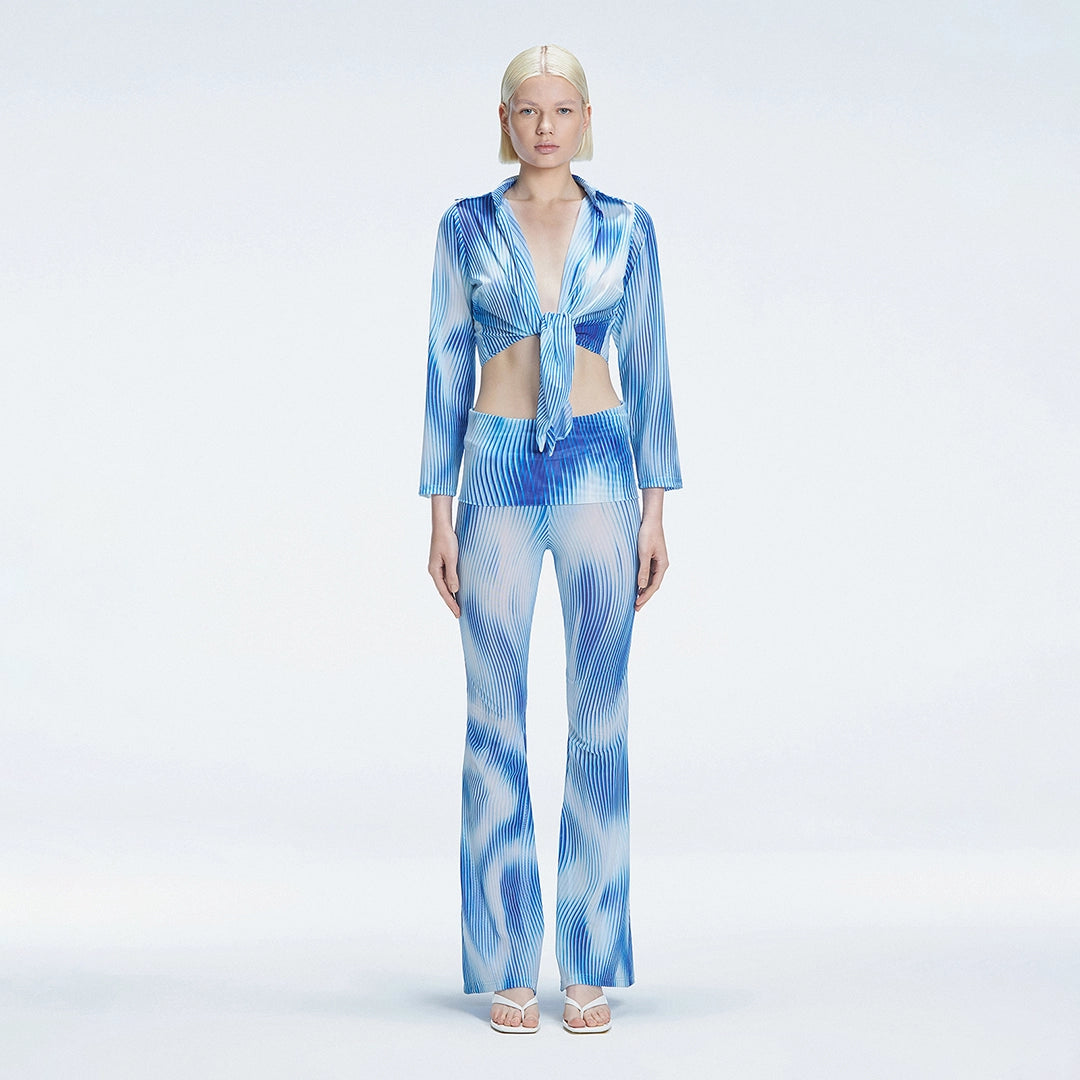 Greta Long Sleeve Tie Front Shirt and Freya High Waist Pants Blue Optical Set | Moeva | | Each week unveils new pieces—luxury swimwear, fluid resort silhouettes, and elevated summer-to-evening essentials designed to carry you from coastal escapes to city nights.