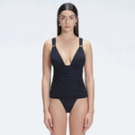 Griselda Black V-Neck Ruched Swimdress with Gold Detail | Moeva | Swimsuit | Each week unveils new pieces—luxury swimwear, fluid resort silhouettes, and elevated summer-to-evening essentials designed to carry you from coastal escapes to city nights.