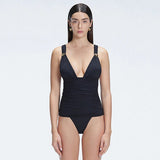 Griselda Black V-Neck Ruched Swimdress with Gold Detail | Moeva | Swimsuit | Each week unveils new pieces—luxury swimwear, fluid resort silhouettes, and elevated summer-to-evening essentials designed to carry you from coastal escapes to city nights.