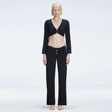 Helena Straight Leg Accessorised Black Pants | Moeva | Pants | Each week unveils new pieces—luxury swimwear, fluid resort silhouettes, and elevated summer-to-evening essentials designed to carry you from coastal escapes to city nights.
