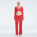 Sirenia Long Sleeve Crop Top and Helena Straight Leg Accessorised Pants Red Set | Moeva | Set | Each week unveils new pieces—luxury swimwear, fluid resort silhouettes, and elevated summer-to-evening essentials designed to carry you from coastal escapes to city nights.