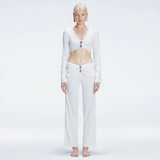 Sirenia Long Sleeve Crop Top and Helena Straight Leg Accessorised Pants White Set | Moeva | Set | Each week unveils new pieces—luxury swimwear, fluid resort silhouettes, and elevated summer-to-evening essentials designed to carry you from coastal escapes to city nights.