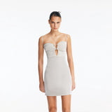 Senna Silver Cut-Out Mini Dress with Accessory Detail | Moeva | Dress | Each week unveils new pieces—luxury swimwear, fluid resort silhouettes, and elevated summer-to-evening essentials designed to carry you from coastal escapes to city nights.