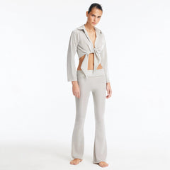 Izara Silver Mid-Rise Flared Pants | Moeva | Pants | Each week unveils new pieces—luxury swimwear, fluid resort silhouettes, and elevated summer-to-evening essentials designed to carry you from coastal escapes to city nights.