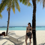 Elvira Jain - Hermione Black Triangle Side Tie 3D Bikini Set - Evita Black Optical Tie Side Sarong | Moeva | | Each week unveils new pieces—luxury swimwear, fluid resort silhouettes, and elevated summer-to-evening essentials designed to carry you from coastal escapes to city nights.