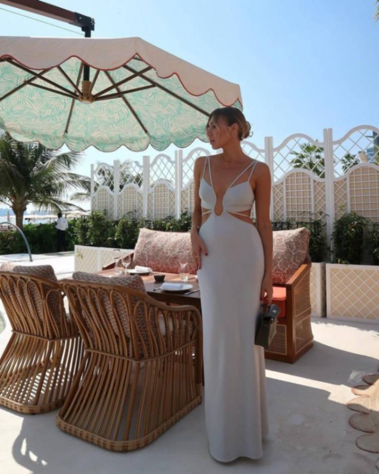 MASHA DUBROVSKAYA - Calla Silver Knitted U-Wire Maxi Dress with Cut-Outs | Moeva | Dress | Each week unveils new pieces—luxury swimwear, fluid resort silhouettes, and elevated summer-to-evening essentials designed to carry you from coastal escapes to city nights.