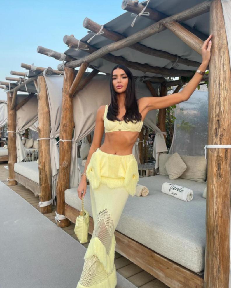 SIOBHAN PERRY-Maris Yellow Knitted Maxi Dress with Fringe and Open Back | Moeva | Set | Each week unveils new pieces—luxury swimwear, fluid resort silhouettes, and elevated summer-to-evening essentials designed to carry you from coastal escapes to city nights.