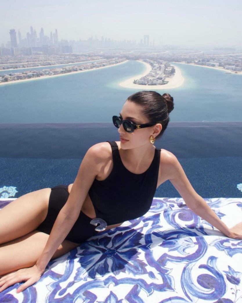 Alice Abdel Aziz - Honora Black High Neck Swimsuit | Moeva | Swimsuit | Each week unveils new pieces—luxury swimwear, fluid resort silhouettes, and elevated summer-to-evening essentials designed to carry you from coastal escapes to city nights.