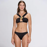 Irma Halter Neck Gold Detail Satin Black Bikini Top | Moeva | Bikini Top | Each week unveils new pieces—luxury swimwear, fluid resort silhouettes, and elevated summer-to-evening essentials designed to carry you from coastal escapes to city nights.
