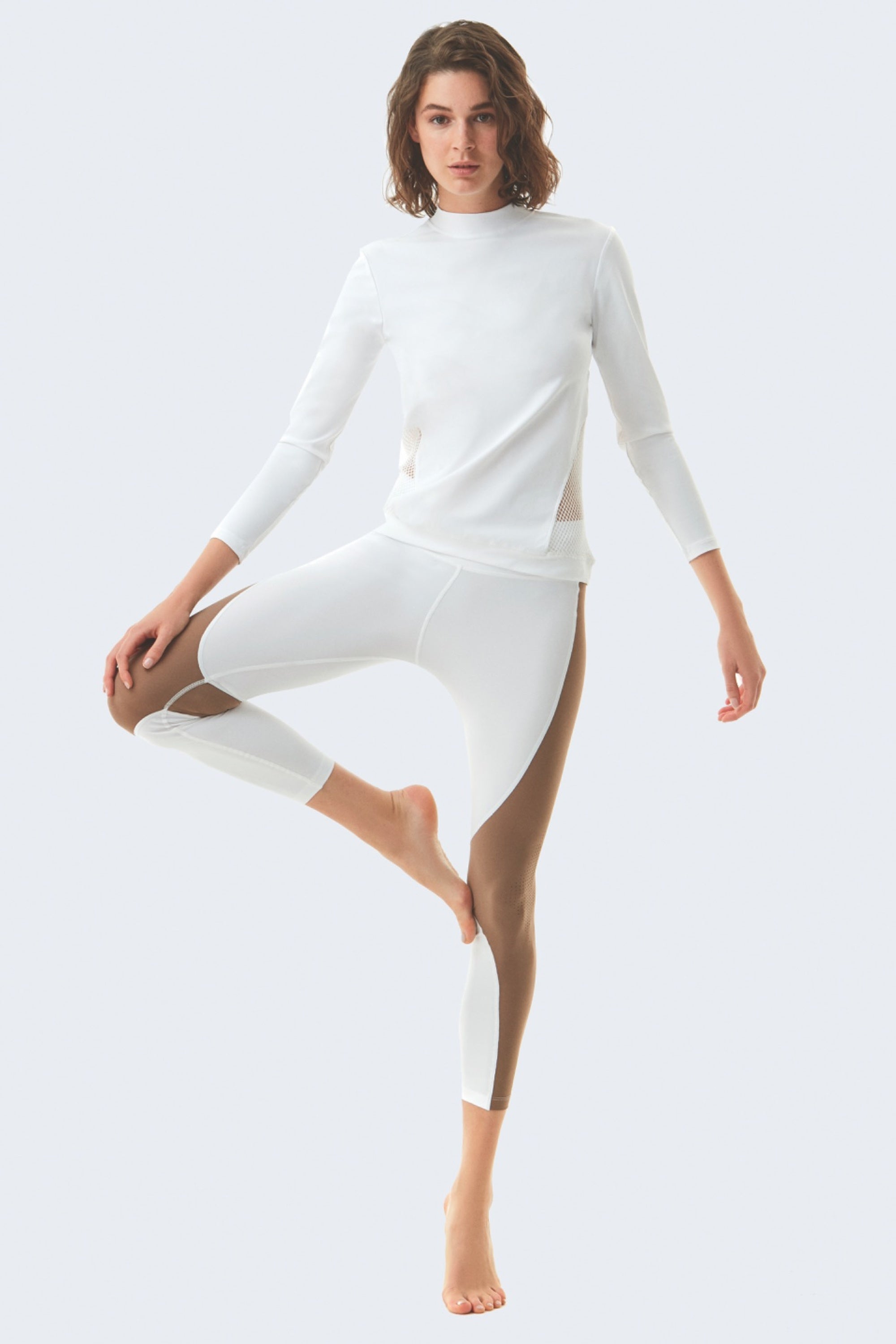 Jasmine White Top | Moeva | Activewear | Each week unveils new pieces—luxury swimwear, fluid resort silhouettes, and elevated summer-to-evening essentials designed to carry you from coastal escapes to city nights.