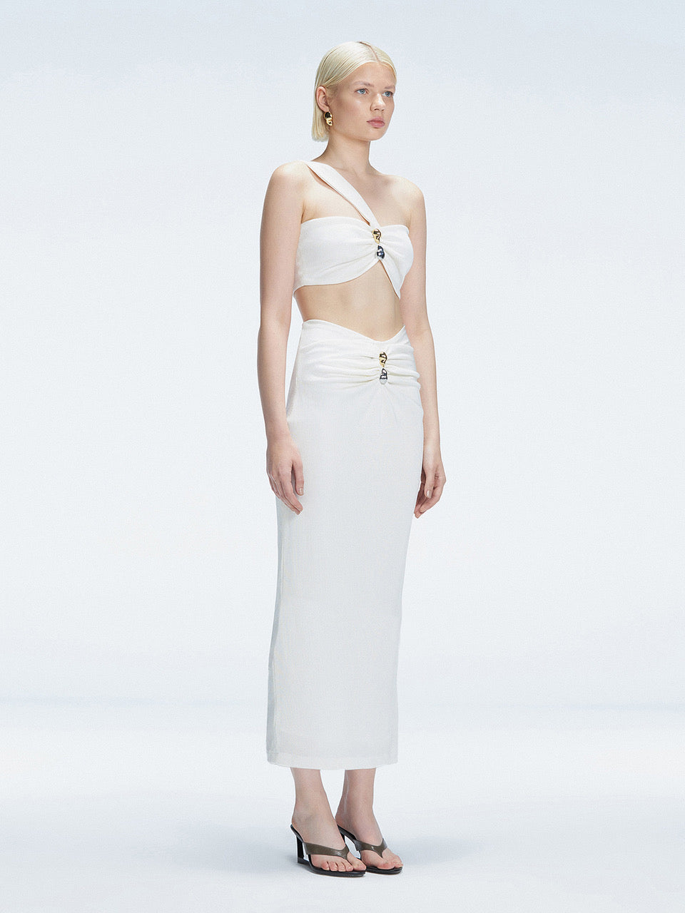 Lane One-Shoulder Black Crop Top and Esmeralda Maxi Skirt with Front Ruched Detail | Moeva | Set | Each week unveils new pieces—luxury swimwear, fluid resort silhouettes, and elevated summer-to-evening essentials designed to carry you from coastal escapes to city nights.