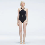 Lyra Black Halter Swimsuit | Moeva | Swimsuit | Each week unveils new pieces—luxury swimwear, fluid resort silhouettes, and elevated summer-to-evening essentials designed to carry you from coastal escapes to city nights.