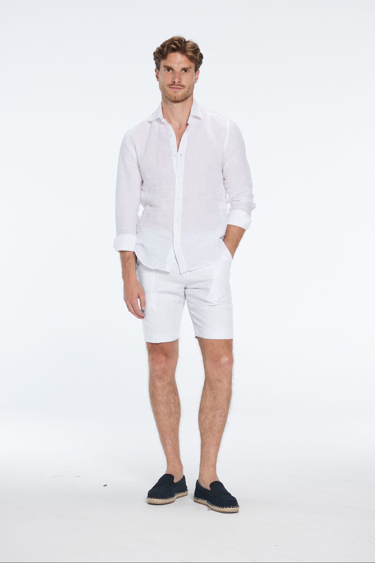 Marco Linen White Shorts | Moeva | Shorts | Each week unveils new pieces—luxury swimwear, fluid resort silhouettes, and elevated summer-to-evening essentials designed to carry you from coastal escapes to city nights.